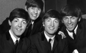 Four Beatles biopics to be directed by "American Beauty" director