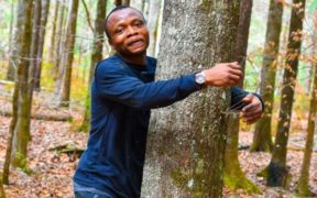 An environmentalist from Ghana smashes the world record by hugging over 1,100 trees in one hour
