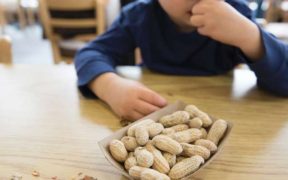 How can parents guard against peanut allergies in their kids?