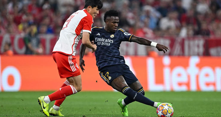 Champions League Drama Vinicius Sparks Real Lead, Bayern Strikes Back