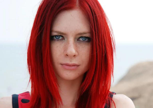 Red hair and dark blue eyes 