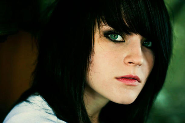 Black hair and green eyes 